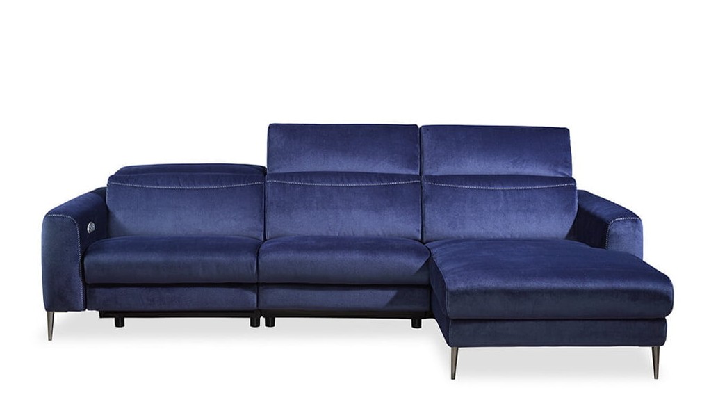 Kler tamsiai mėlyna veliūrinė kampinė sofa Capriccio su pakeltais galvos atlošais
