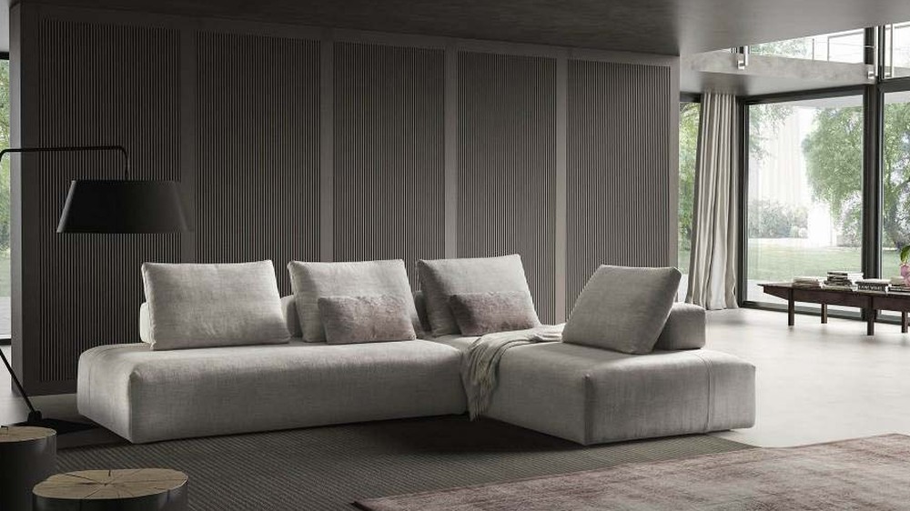 Smėlio spalvos kampinė sofa Jest Droll prie stiklinių sienų, SAMOA DIVANI